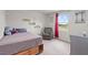 Bedroom with a chair, a bed, and natural light from a window at 1110 Bent Willow Dr, Durham, NC 27704