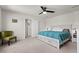 Comfortable bedroom features neutral colors, a ceiling fan, and soft carpet at 1110 Bent Willow Dr, Durham, NC 27704