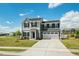 Two-story home with attached two-car garage, well-manicured lawn and landscaping, curb appeal at 1110 Bent Willow Dr, Durham, NC 27704