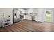 Modern kitchen featuring stainless steel appliances, white cabinetry, and a functional layout at 1110 Bent Willow Dr, Durham, NC 27704