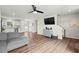 Sun-filled living area offering hardwood floors and an open layout with easy access to the well-lit kitchen at 1110 Bent Willow Dr, Durham, NC 27704