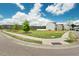 Corner lot near street sign surrounded by grassy area and sidewalks, with homes in background at 1110 Bent Willow Dr, Durham, NC 27704