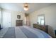 Bright bedroom featuring modern furniture, a walk-in closet, and neutral tones creating a serene atmosphere at 112 Red Admiral Ct, Hillsborough, NC 27278