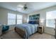 Comfortable bedroom features natural light, a queen bed, and tasteful décor perfect for relaxation and rest at 112 Red Admiral Ct, Hillsborough, NC 27278