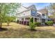 Beautiful two-story home with a covered porch and lush landscaping at 112 Red Admiral Ct, Hillsborough, NC 27278