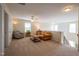 Upstairs living room featuring ample seating space and a view of the downstairs foyer at 112 Red Admiral Ct, Hillsborough, NC 27278