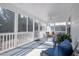 Inviting screened porch with comfortable seating and a ceiling fan at 112 Red Admiral Ct, Hillsborough, NC 27278