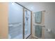 Walk-in shower in main bathroom with glass enclosure and tiled walls at 112 Red Admiral Ct, Hillsborough, NC 27278