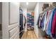 Walk-in closet featuring organized shelving and rods for ample storage space at 112 Red Admiral Ct, Hillsborough, NC 27278