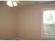 Bedroom with carpet, and natural light streaming through a window with blinds at 1215 Agile Dr, Knightdale, NC 27545
