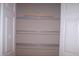 Pantry with multiple shelves, providing ample storage space at 1215 Agile Dr, Knightdale, NC 27545