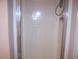 Shower with a frosted sliding door and chrome fixtures, providing a private and functional space at 1215 Agile Dr, Knightdale, NC 27545