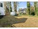 Large backyard with shed, mature trees, and ample open space at 12325 Inglehurst Dr, Raleigh, NC 27613