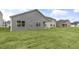 The backyard has newly laid sod and a covered patio at 128 Pisgah St, Sanford, NC 27330