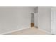 Neutral bedroom with carpet flooring, light gray walls, and white trim and doors at 128 Pisgah St, Sanford, NC 27330