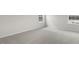 Bright bedroom with neutral carpet and a large window for lots of natural light at 129 Pisgah St, Sanford, NC 27330