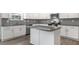 Modern kitchen featuring stainless steel appliances, granite countertops and subway backsplash at 129 Pisgah St, Sanford, NC 27330