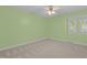 Bedroom with neutral carpet and ceiling fan at 1304 Deboy St, Raleigh, NC 27606