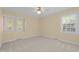 Bedroom with neutral carpet and two windows for lots of light at 1304 Deboy St, Raleigh, NC 27606