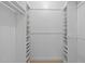 Walk-in closet showing built in shelving and racks for organization and storage at 1304 Deboy St, Raleigh, NC 27606