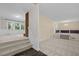 Bright living room with a fireplace and open layout featuring carpet flooring at 1304 Deboy St, Raleigh, NC 27606