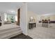 Bright living room with a fireplace and open layout featuring carpet flooring and furniture at 1304 Deboy St, Raleigh, NC 27606