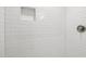 Modern shower featuring tiled walls and niche at 1304 Deboy St, Raleigh, NC 27606