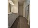 Modern bathroom featuring a double sink vanity and a glass shower at 136 Baneberry Pl, Broadway, NC 27505