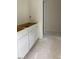 Unfinished bathroom with white vanity and access to hallway at 136 Baneberry Pl, Broadway, NC 27505