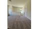 Upstairs bonus room with neutral carpet and lots of natural light at 136 Baneberry Pl, Broadway, NC 27505