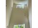Spacious room with high ceilings, natural light streaming through large windows at 136 Baneberry Pl, Broadway, NC 27505