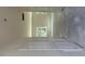 A bright hallway featuring multiple windows that bring in natural light at 136 Baneberry Pl, Broadway, NC 27505