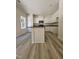 Bright kitchen with island, stainless appliances, and modern finishes at 136 Baneberry Pl, Broadway, NC 27505