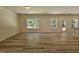 Spacious living room with wood-look floors and lots of natural light at 136 Baneberry Pl, Broadway, NC 27505