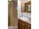 Compact bathroom featuring a shower and vanity with ample storage, designed for efficiency and comfort at 150 Big Horn Cv, Louisburg, NC 27549