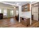 Open living area with transition to outdoor, features wood finishes, comfortable furniture and natural light at 150 Big Horn Cv, Louisburg, NC 27549