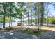 Big Horn Park features lakeside recreation, kayak racks, and shade trees at 150 Big Horn Cv, Louisburg, NC 27549