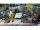 Community aerial view featuring a pool, pond, parking, and beautifully maintained common areas for residents at 150 Red Admiral Ct, Hillsborough, NC 27278