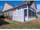 Backyard view with screened porch, great for outdoor living and entertaining at 150 Red Admiral Ct, Hillsborough, NC 27278