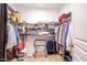 Walk-in closet features ample storage with wire shelving and organized clothing racks at 150 Red Admiral Ct, Hillsborough, NC 27278