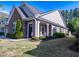 Desirable home exterior with stone and shake siding, plus a covered porch at 150 Red Admiral Ct, Hillsborough, NC 27278