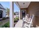 Cozy front porch offering comfortable seating and a pleasant view at 150 Red Admiral Ct, Hillsborough, NC 27278
