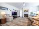 Spacious living room with a cozy fireplace and neutral color palette at 150 Red Admiral Ct, Hillsborough, NC 27278