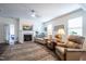 Comfortable living room featuring a fireplace and neutral décor at 150 Red Admiral Ct, Hillsborough, NC 27278