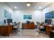 Bright home office features dual desks, a central storage unit, and overhead lighting at 150 Red Admiral Ct, Hillsborough, NC 27278