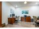 Bright home office features a wood desk, a storage unit, and overhead lighting at 150 Red Admiral Ct, Hillsborough, NC 27278