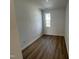 Cozy bedroom with natural light and sleek wood flooring at 1577 Wendell Valley Blvd, Wendell, NC 27591