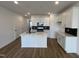 Bright kitchen features a center island, ample cabinets, and recessed lighting at 1577 Wendell Valley Blvd, Wendell, NC 27591