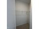 Small walk-in closet with shelving for efficient storage at 1577 Wendell Valley Blvd, Wendell, NC 27591