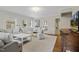 Bright living room with hardwood floors, neutral furniture, and decorative accents at 2008 Reaves Dr, Raleigh, NC 27608